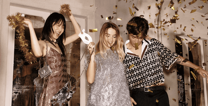 Three people in 24S partywear from the party season clothing category