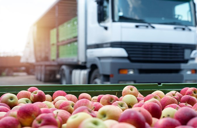 Truck delivering Apples