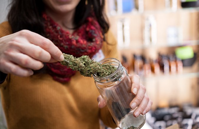 Woman holding Cannabis