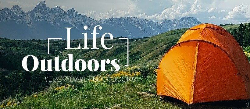 Outdoor camping gear and a camping tent on a mountain in the sun. Text reads: Life Outdoors #EverydayLifeOutdoors