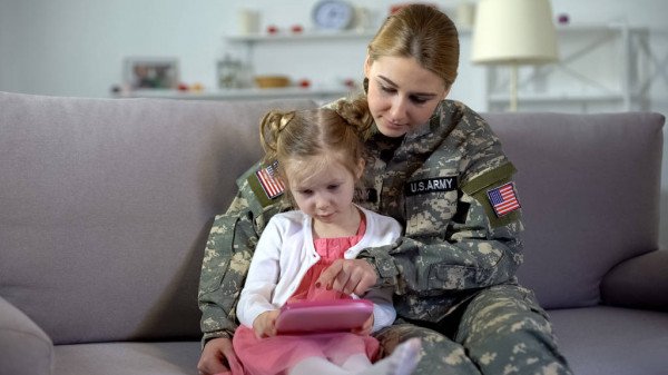 Military member and girl