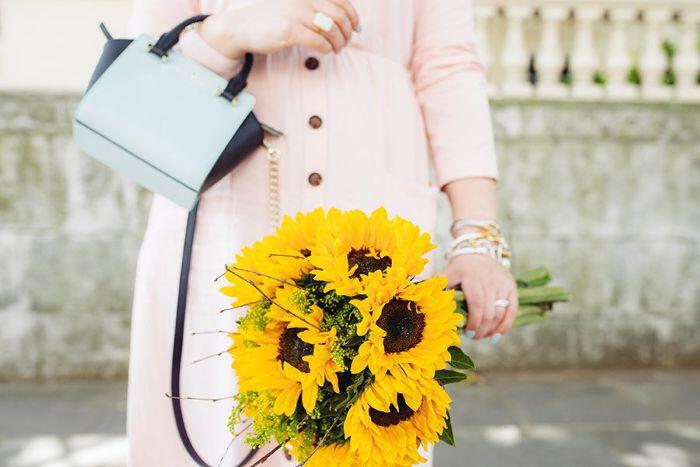 Image showing a person holding flowers