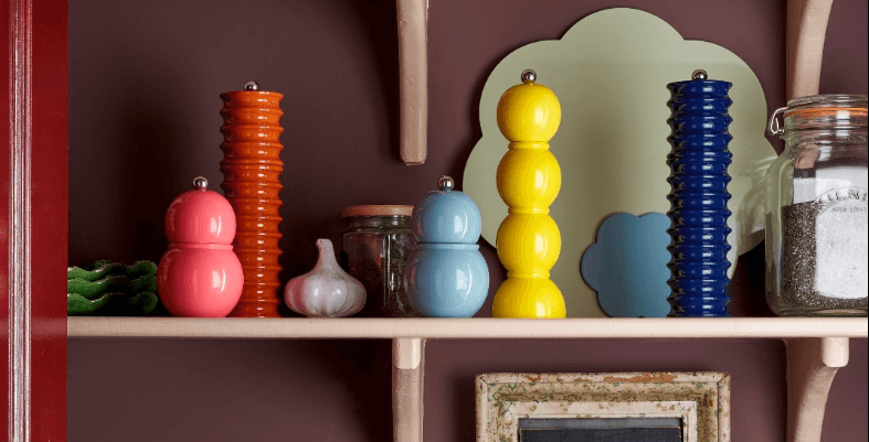 Addison Ross savings guide banner. Image shows a selection of products on a kitchen shelf including brightly coloured salt and pepper grinders