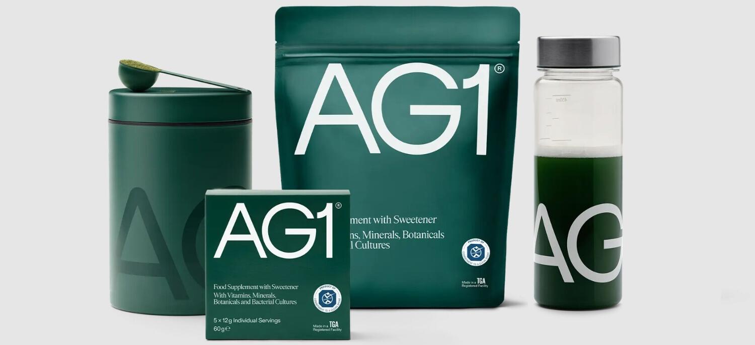 AG1 savings guide banner showing a selection of branded green products against a grey backdrop