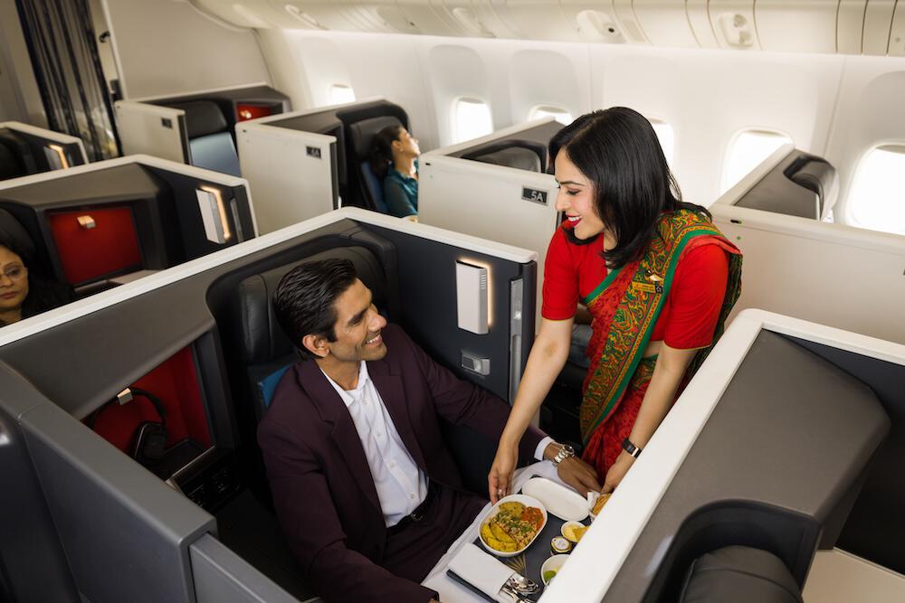 Man riding in Air India business class seat