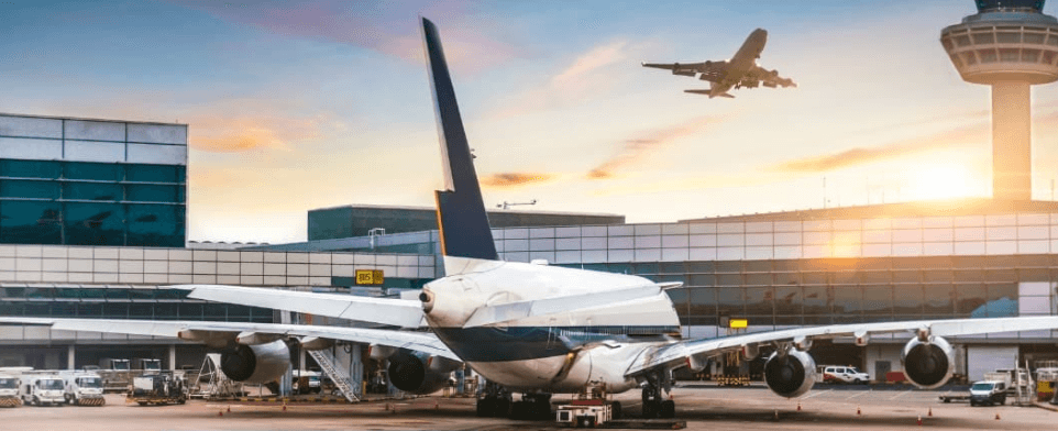 Airport Parking Luton savings guide - Image shows a plane parked outside of an airport