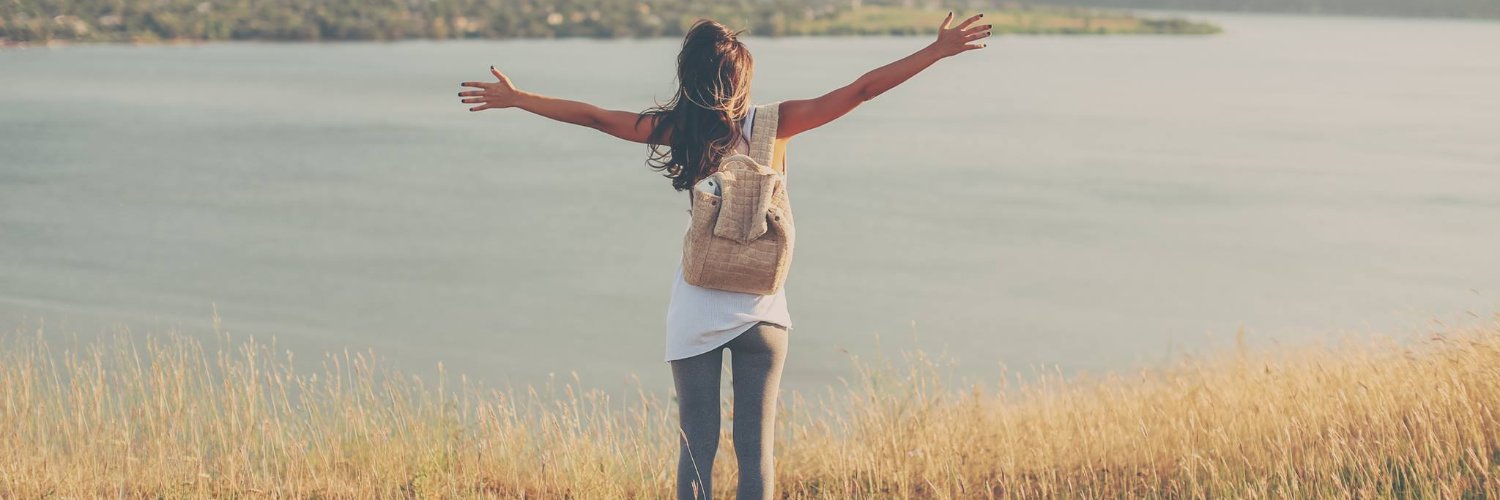 Alpha Travel Insurance banner - woman travelling