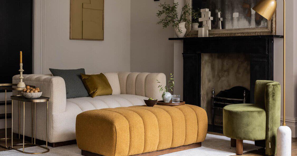 Atkin & Thyme offers page banner - Picture of living room with cream sofa and modern accessories