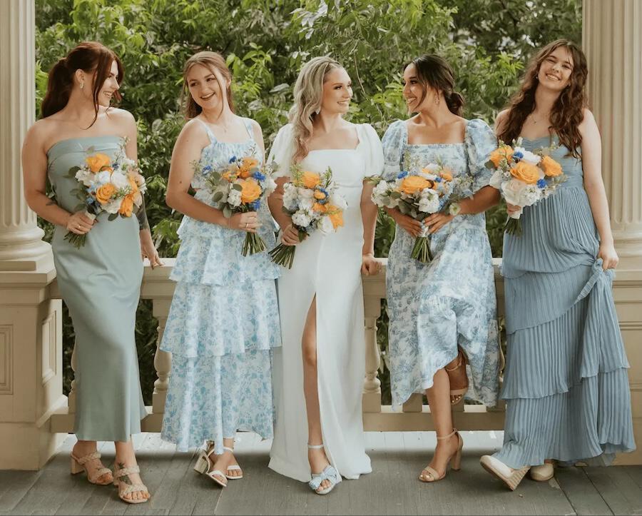 Women wearing AW Bridal wedding dress and bridesmaids dresses