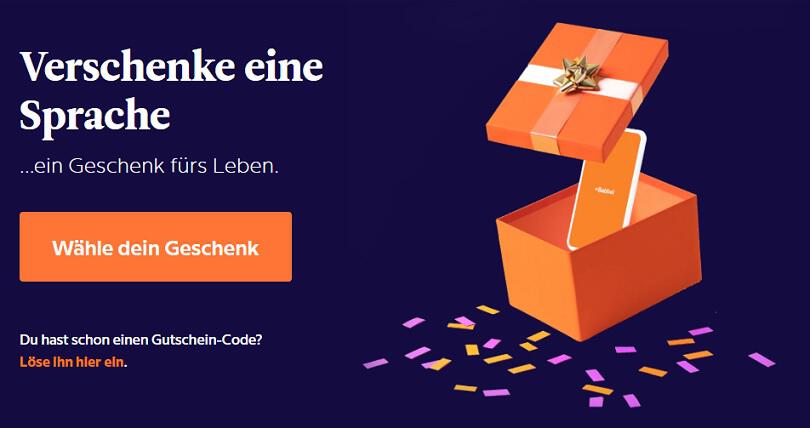 Smartphone mit Babbel Logo in orangefarbener Geschenkbox und Hinweis auf die Möglichkeit, Babbel verschenken zu können