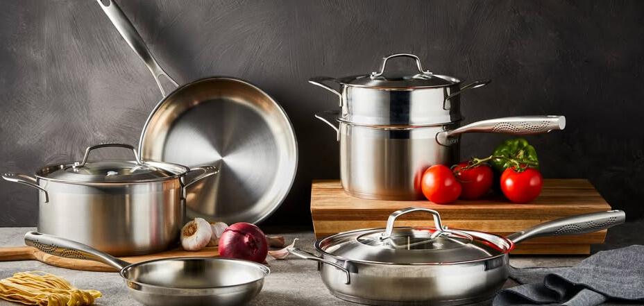 Baccarat deals page image featuring a selection of shiny pans alongside some tomatoes and pasta