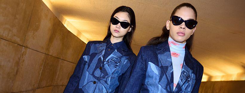 bannière photo Kenzo montrant deux mannequins portant des lunettes de soleil Kenzo