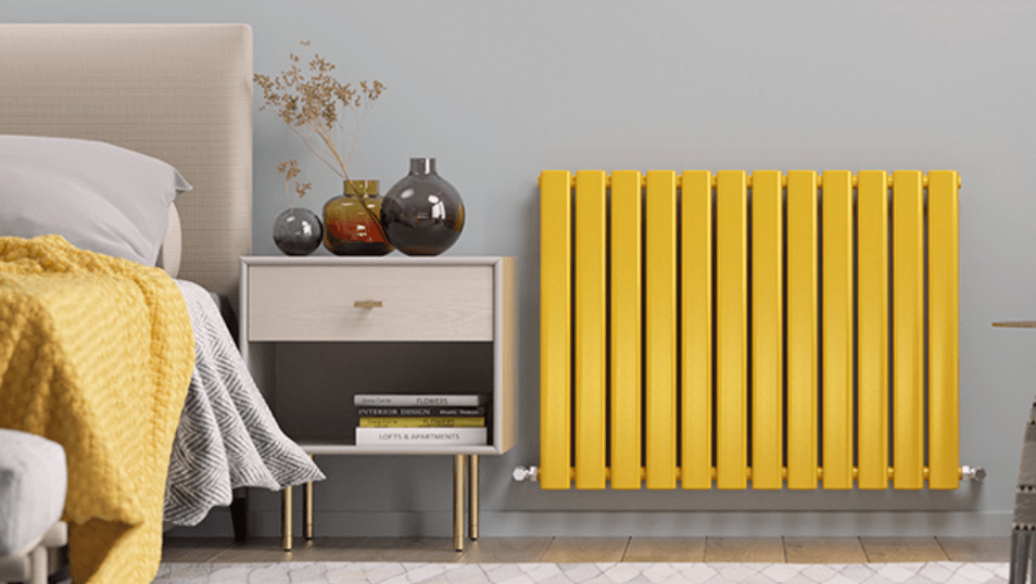 Best Heating offers page banner - A modern yellow radiator in a bedroom setting