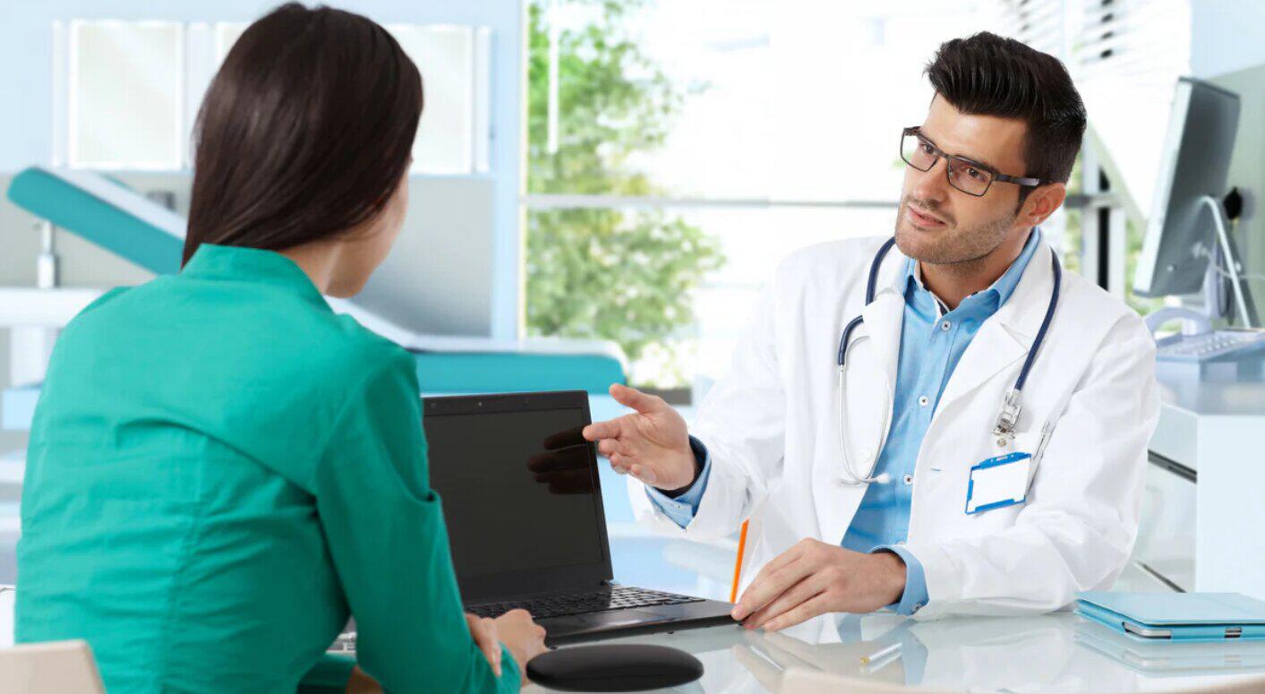 BioID savings guide image showing a consultation between a male doctor and a woman