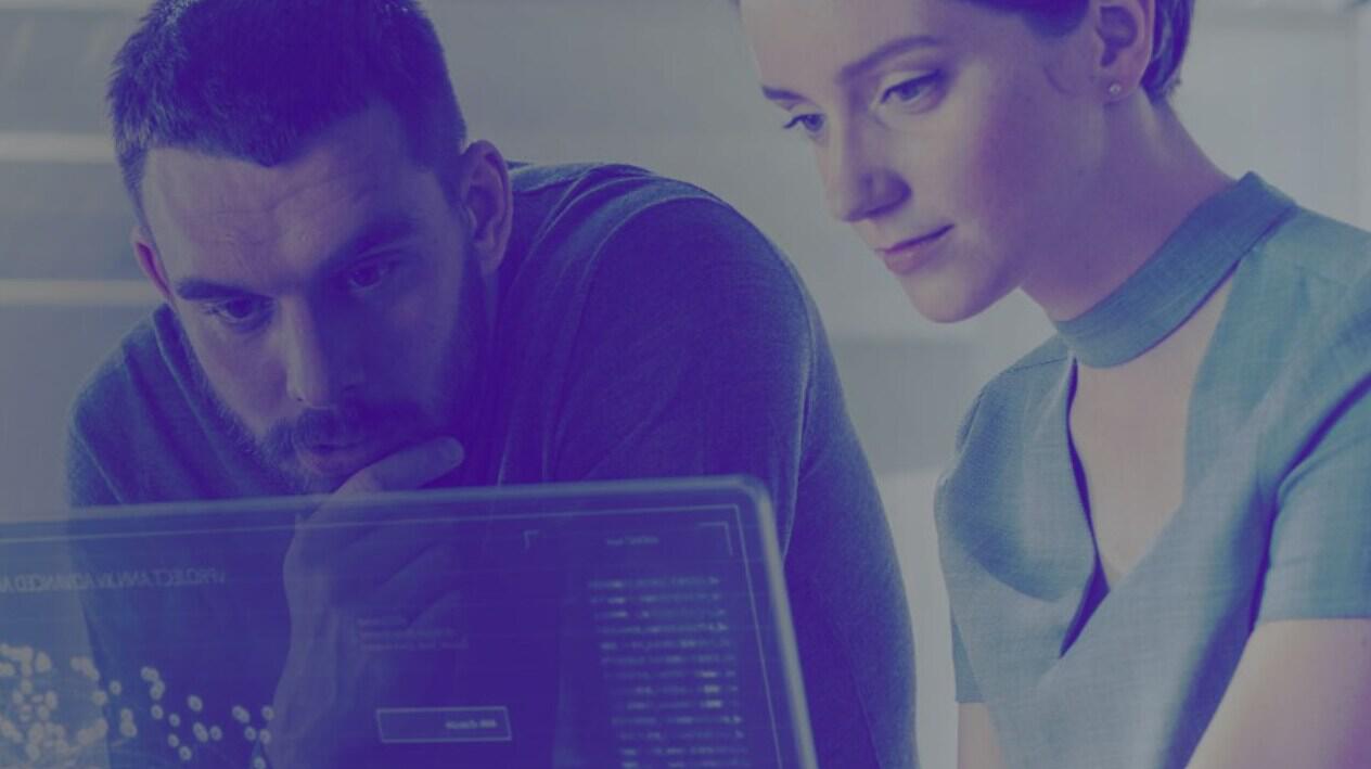 Bitdefender deals page banner showing a man and woman looking at a monitor