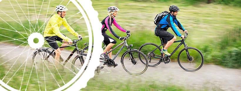 Banner für die Boc24 Gutscheinseite mit dire fahrradfahrenden Personen im Grünen