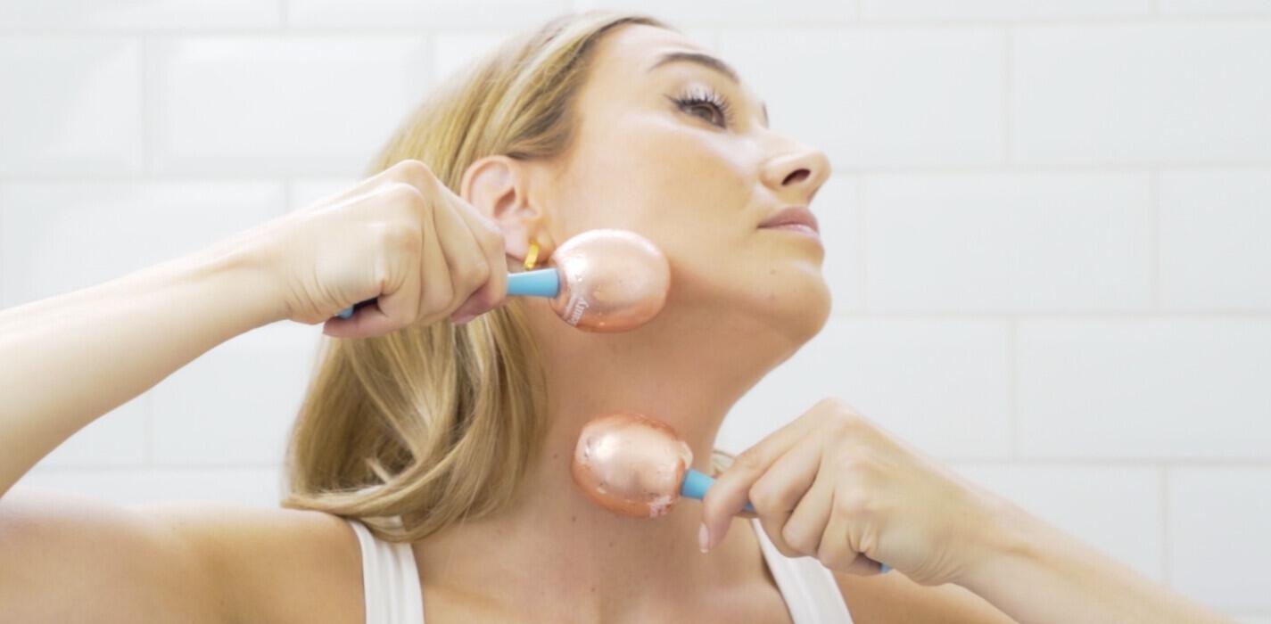 Bondi Body savings page banner - Woman using Cryo facial sticks on her face