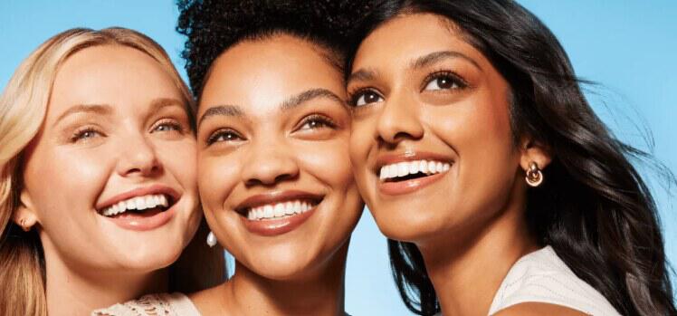 Bondi Sands deals page featuring three fresh-faced women looking up and smiling