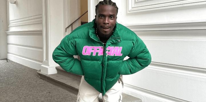 boohooMAN winter banner featuring a man wearing green puffa jacket