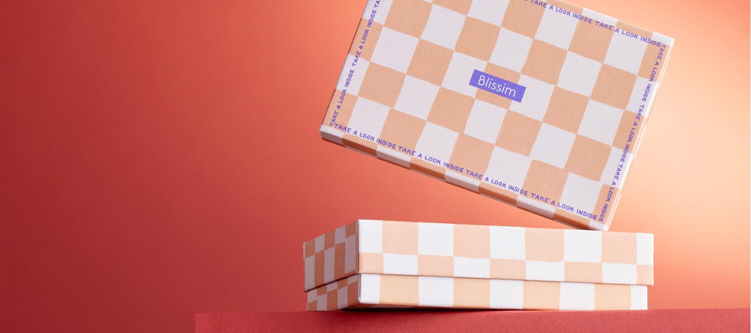 Box Blissim sur fond rouge
