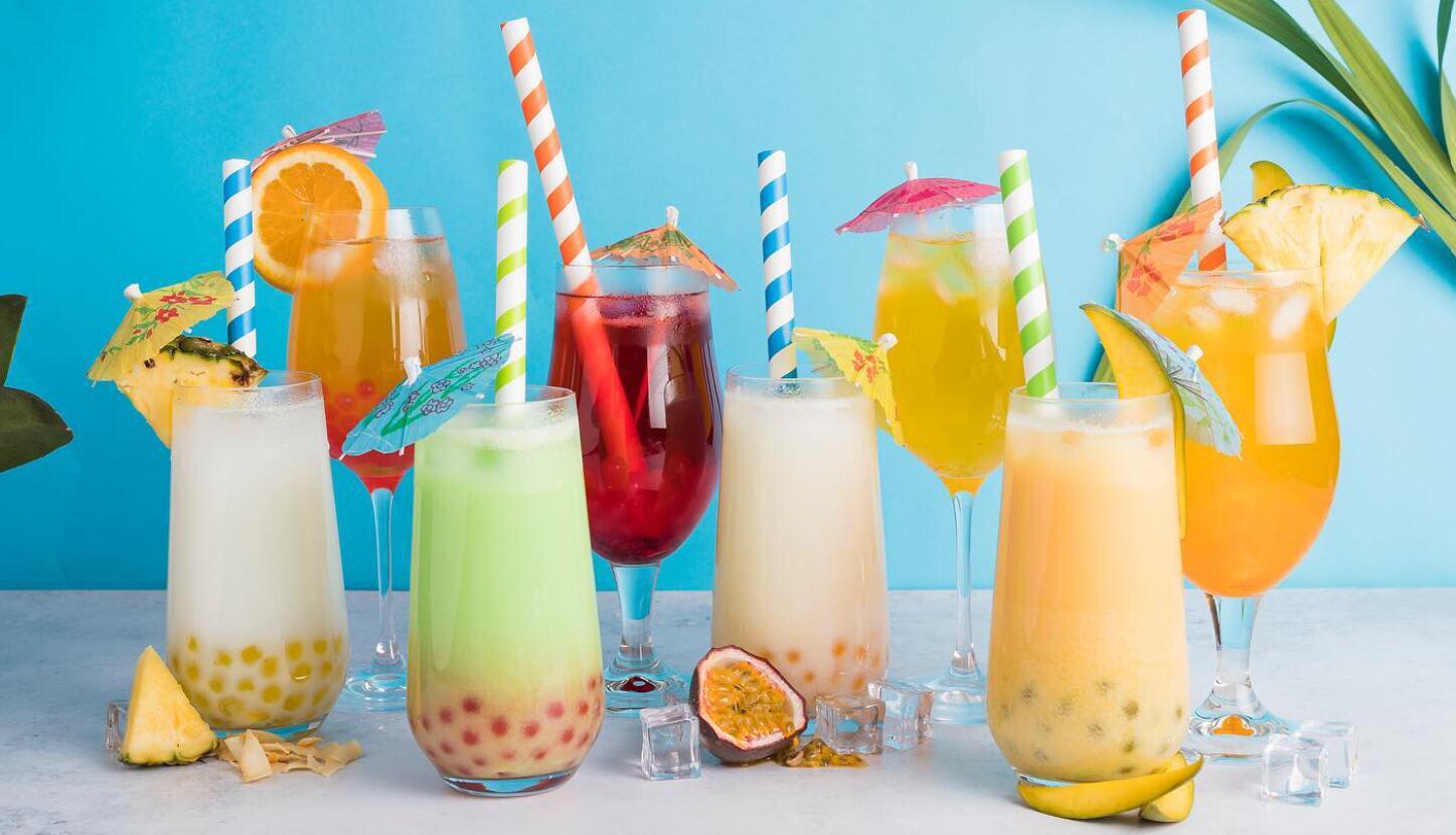 Bubble Panda deals page banner - Multiple tea drinks in glasses with colourful straws and parasols against a bright blue backdrop