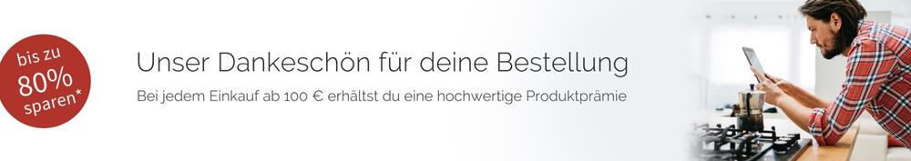 Banner für bis zu 80 % auf Butch Prämien ab 100 € Einkauf; Mann mit Tablet in den Händen lehnt am Kochfeld