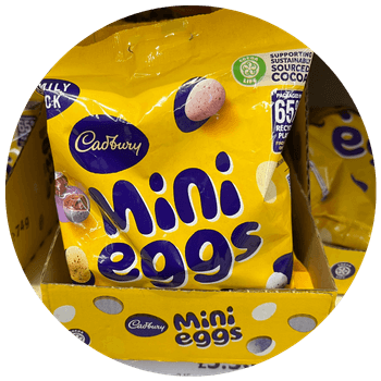 A bag of Cadbury mini eggs sat on a supermarket shelf