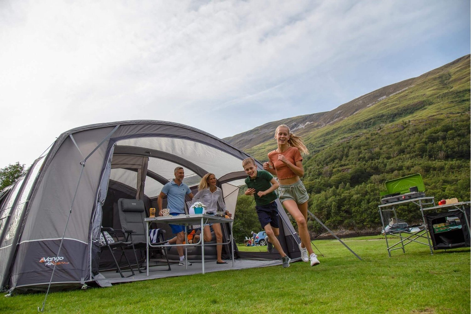 Family enjoying a camping holiday in a family tent from Winfields