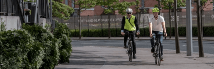 Chain Reaction Cycles – 2 people cycling on the streets