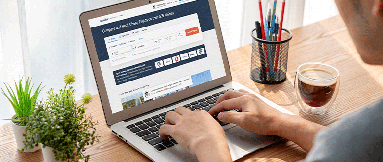 Person booking flight online with CheapOair