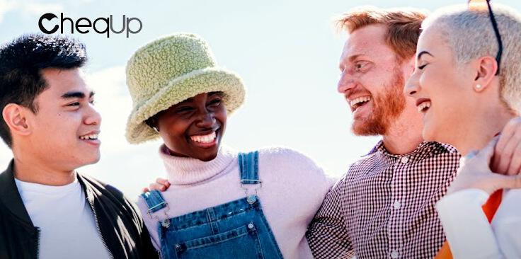 CheqUp offers page banner - Four diverse people laughing with company logo in the top left corner