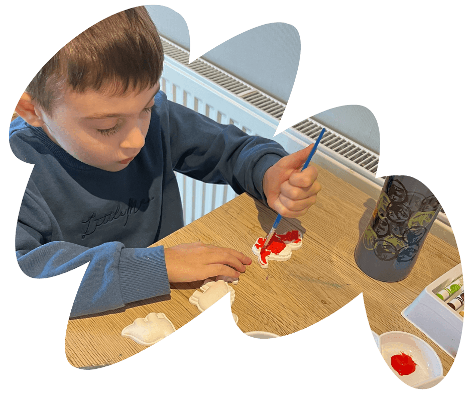 Emily Ambler's son crafting at home image