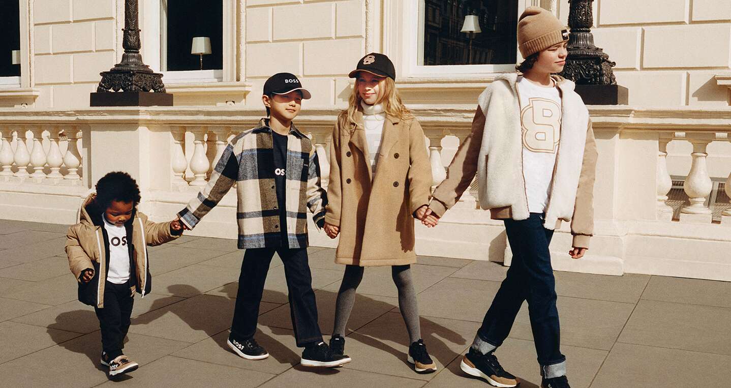 Childsplay Clothing ways to save banner featuring four differently aged children holding hands while wearing designer clothing
