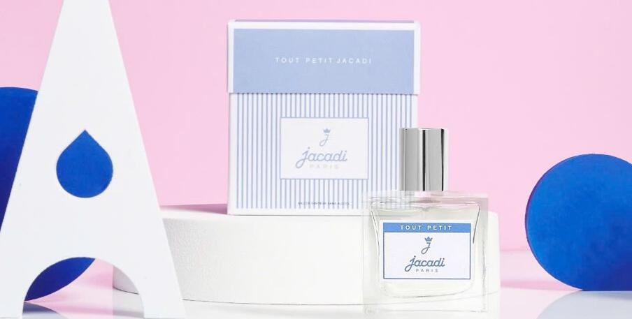 City Perfume deals page banner showing a Jacadi fragrance bootle alongside a the box in a blue and pink geometric setting