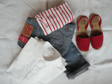 clothes-folded-on-bed