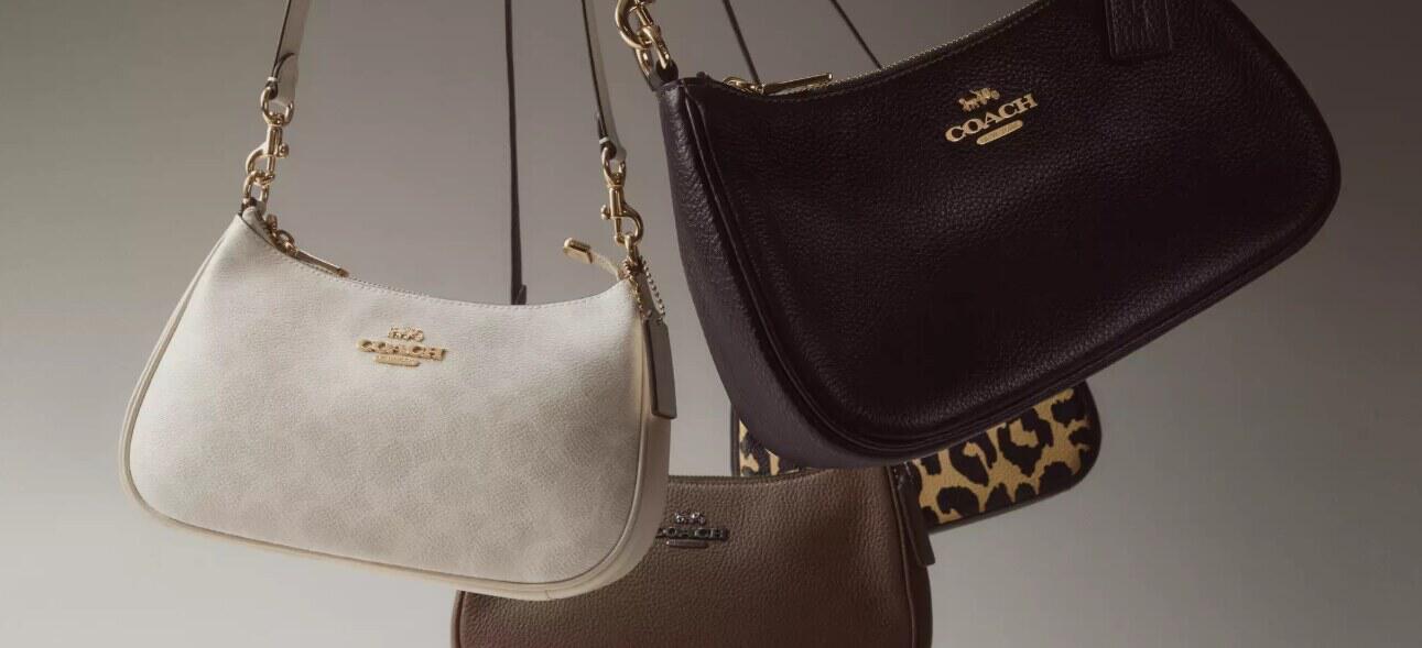 Coach Outlet deals page showing four handbags in different collours hanging in front of a pale background