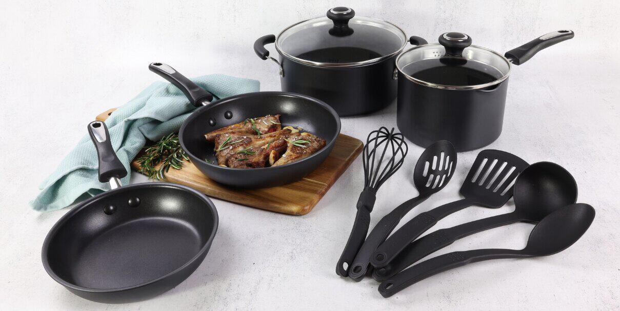 Cookware Brands deals page banner showing a selection of black pots and pans on a pale surface