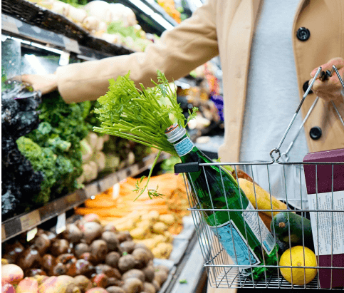 Person shopping for groceries in a supermarket