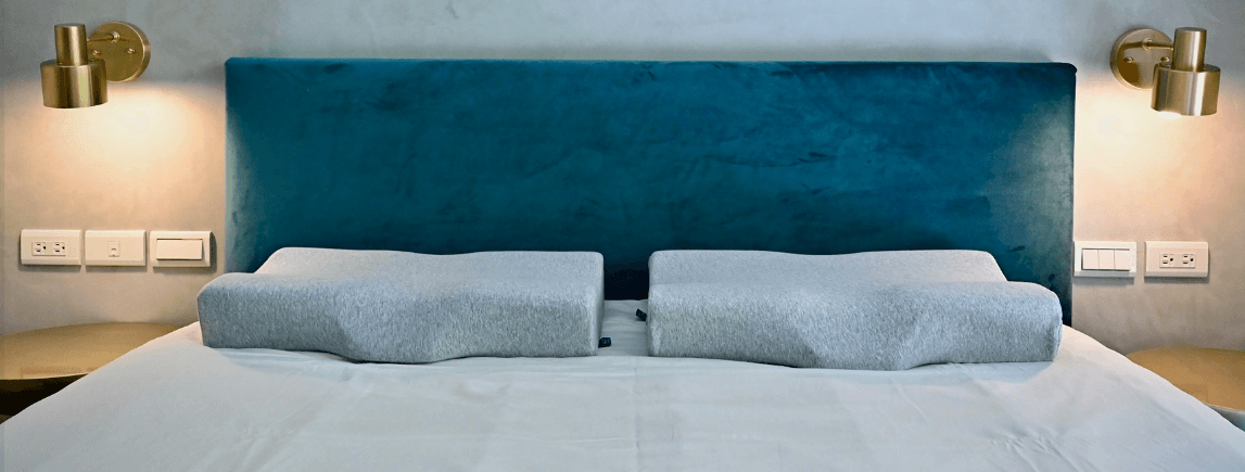 Cushion Lab pillows on a bed