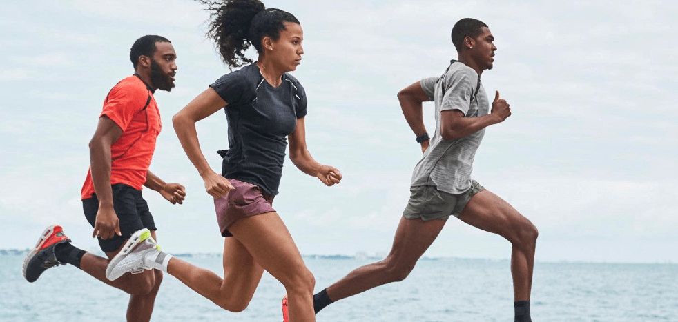 Direct-Running money saving guide image showing 2 men and a woman running at the coast