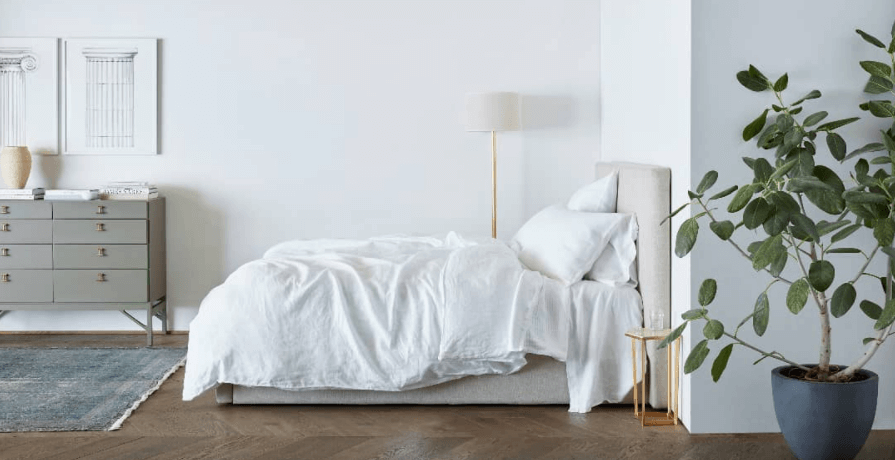 DreamCloud discount code for bed with a white duvet