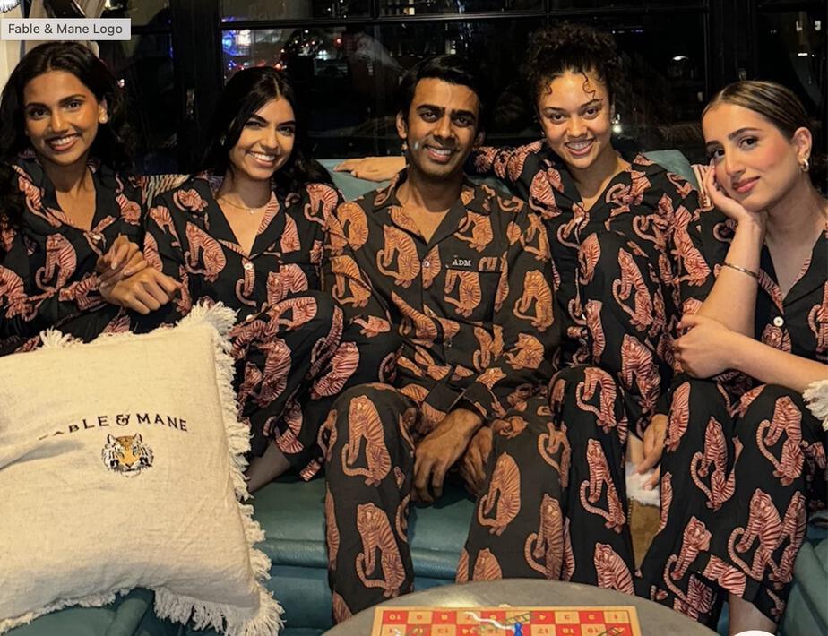 a group of people wearing fable and mane pajamas