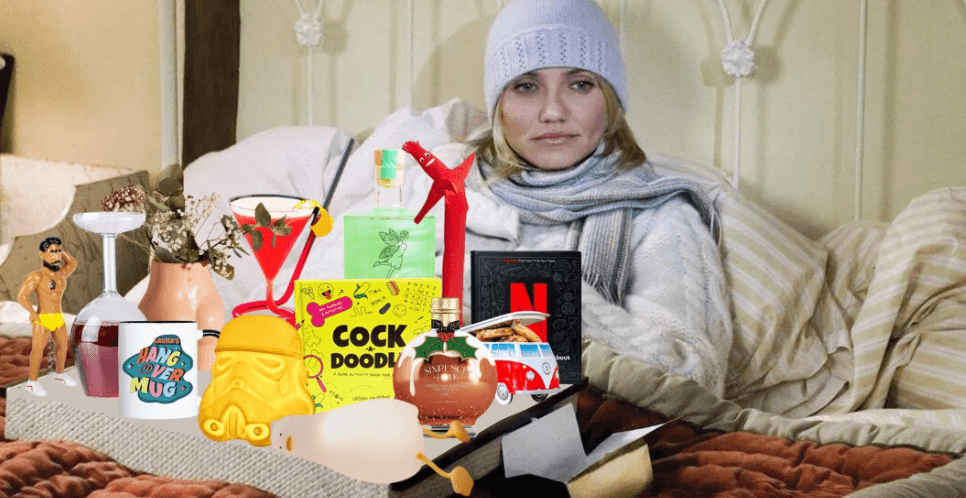 Firebox gifts - Woman in bed with an assortment of gifts on her lap