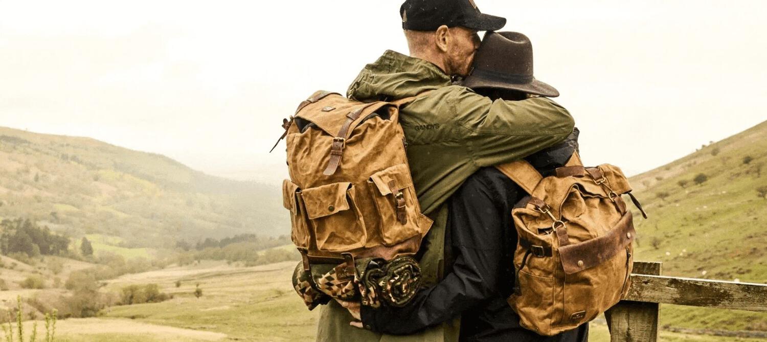 Gandys ways to save banner featuring a man a woman wearing outerwear hugging in the countryside