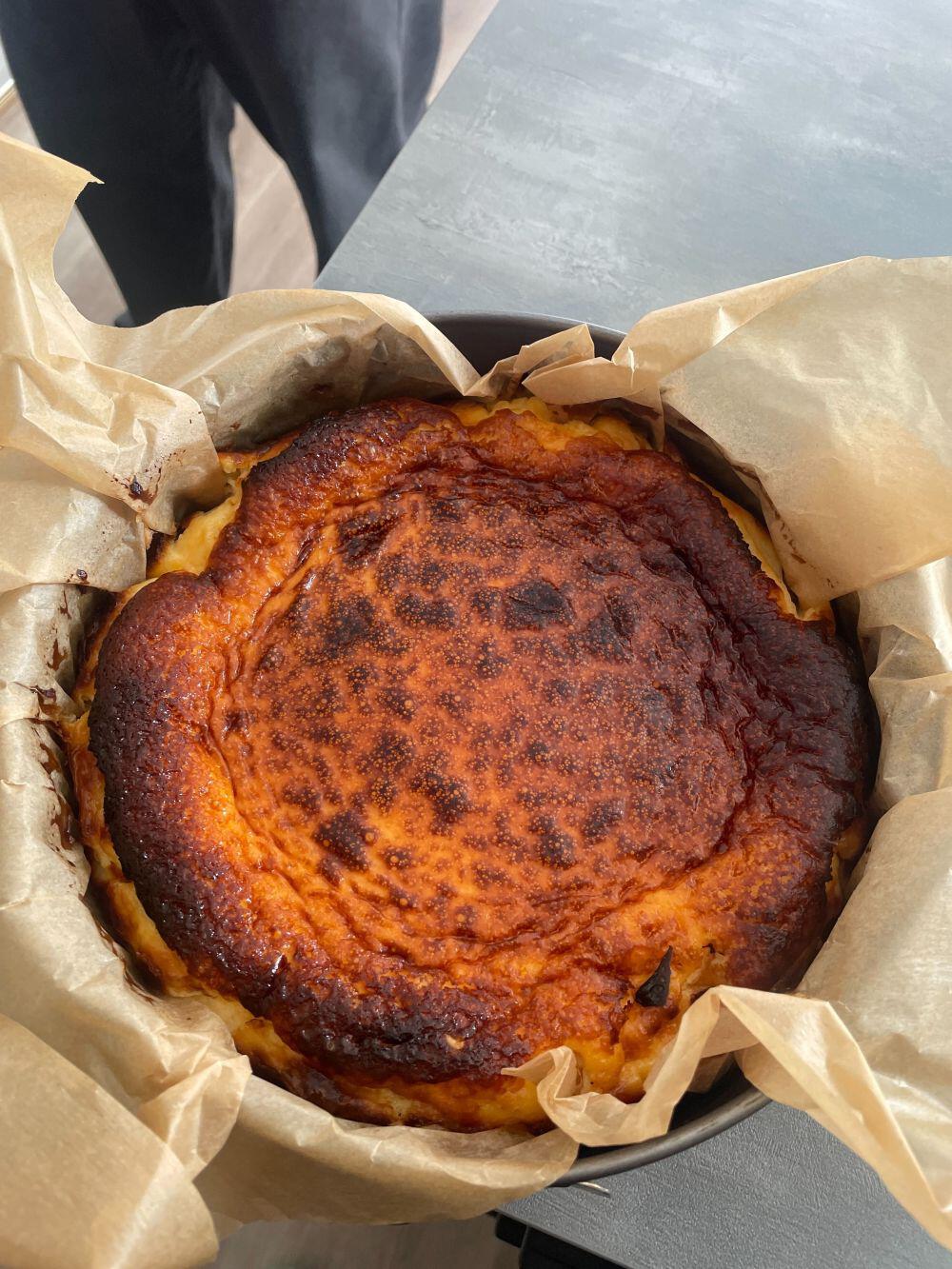 Top view of full burnt basque cheesecake in cooking pot