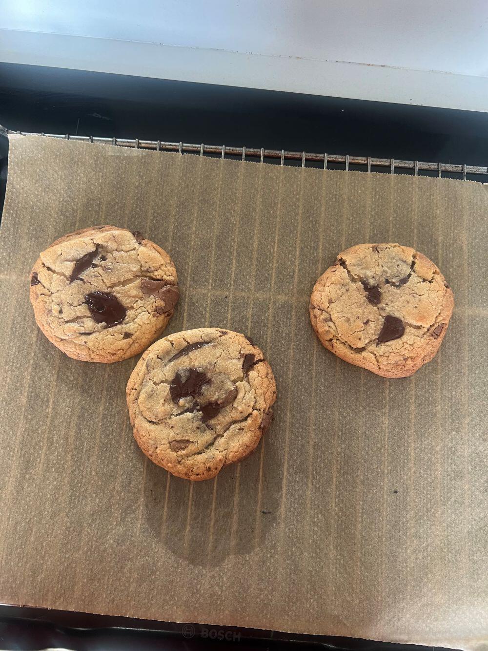Three baked brown butter chocolate cookies