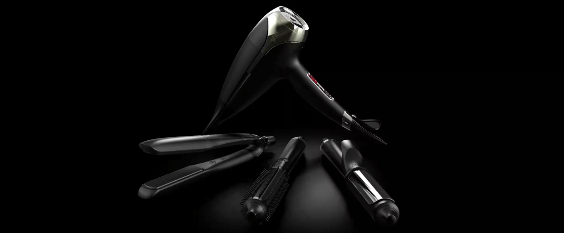 ghd Black Friday seasonal image - A selection of black haircare devices against a dark background