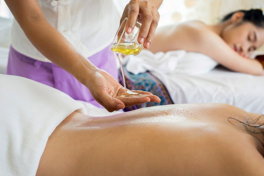 Gift Experience category page - spa, woman recieving massage treatment
