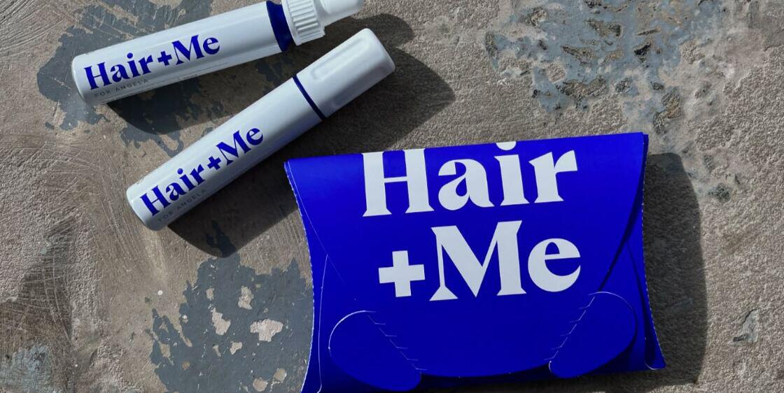 Hair and Me savings tips banner showing 2 branded products beside a bright blue cardboard box