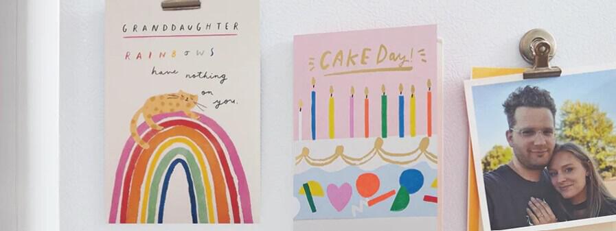 Hallmark savings image showing a selection of greeting cards pinned onto a board